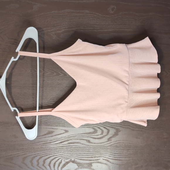 21 saints Tops - Pink peplum top